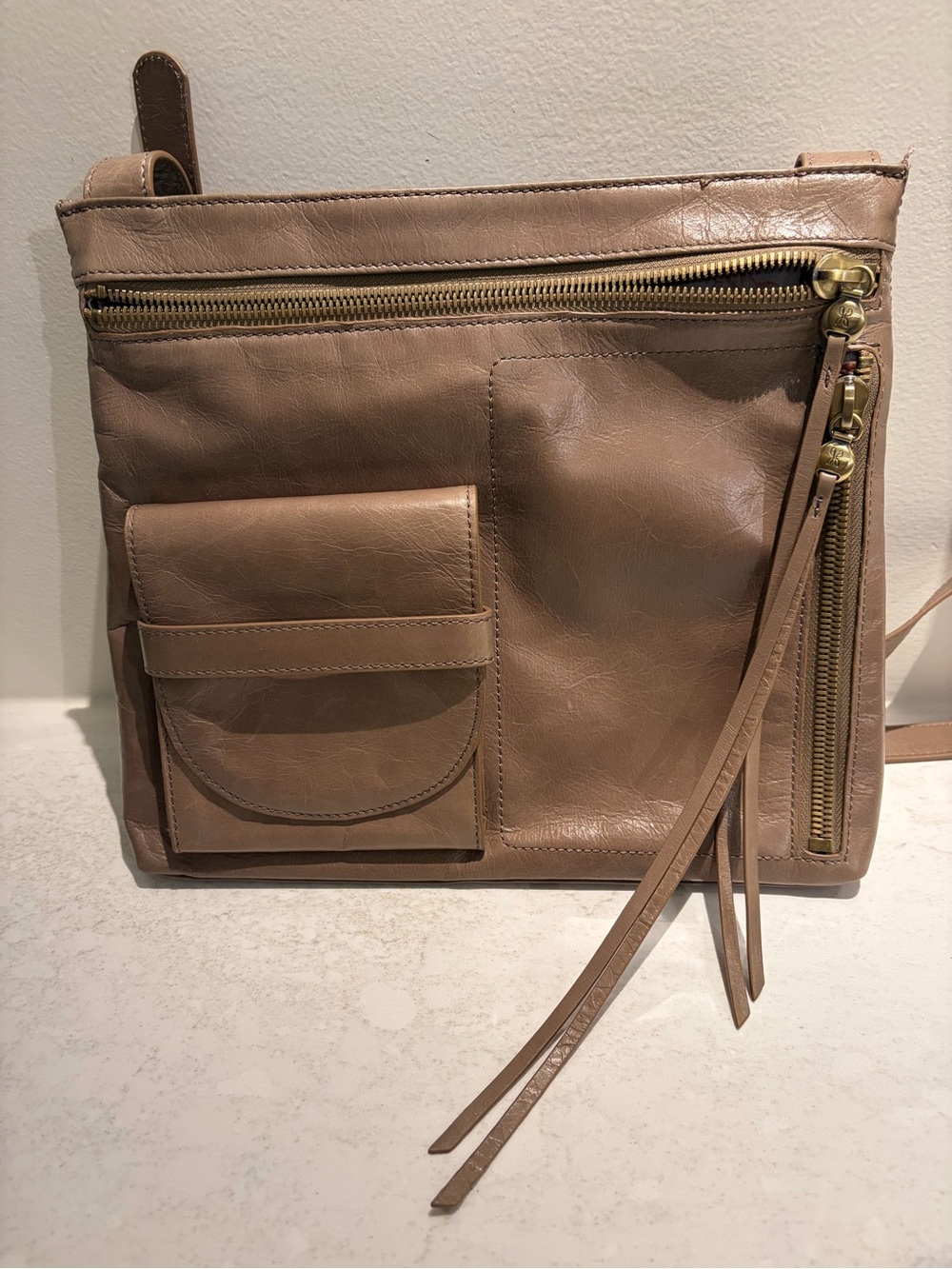 HOBO Taupe Crossbody with Front Pocket and Tassel Zipper